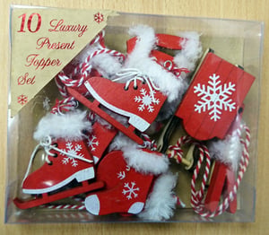 A box of 10 luxury present topper sets.