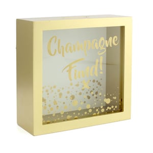 A gold piggy bank that says "champagne fund."