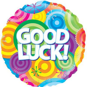 A colorful balloon with the words "good luck" written on it.