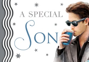 A man wearing sunglasses is drinking from a blue cup that says "a special son."