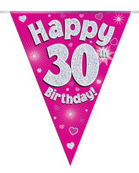 A pink banner that says, "Happy 30th birthday," on it.