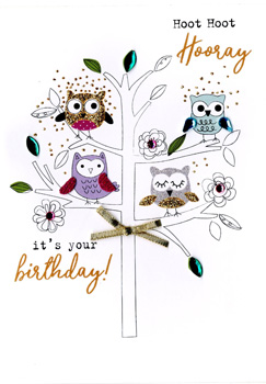 A birthday card with four owls on a tree branch.