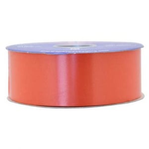 A close-up of a roll of orange ribbon on a white background.