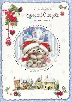 A Christmas card that says a wish for a special couple at Christmas.