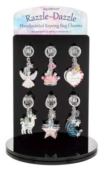 A display of hand-painted keyring bag charms.