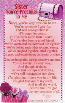 A card that says "Sister, you're precious to me."