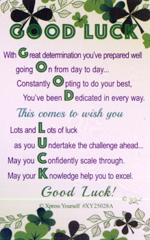 A card that says, "Good luck! With great determination, you've prepared well, going on from day to day."