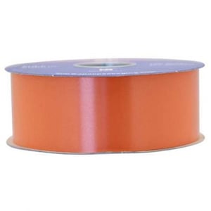 A close-up of a roll of orange ribbon is on a white background.