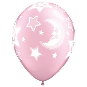 A pink balloon with a crescent moon and stars on it.