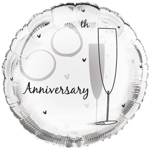 A silver anniversary balloon with two glasses of champagne on it.