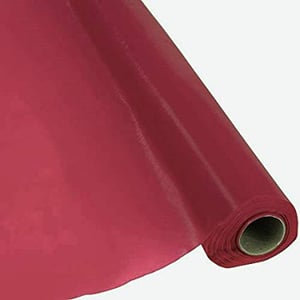 A roll of red wrapping paper is on a white background.