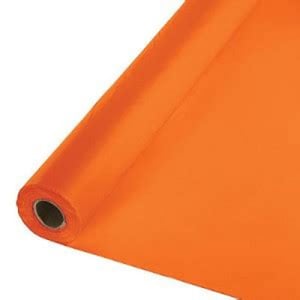 A roll of orange paper with a hole in the middle is on a white background.