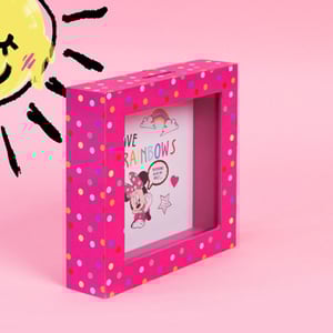 A pink box with a picture of Minnie Mouse and the words "Love rainbows".