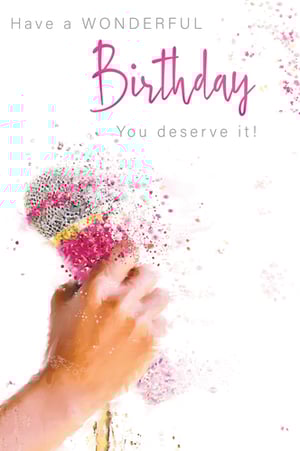 A birthday card that says, "Have a wonderful birthday. You deserve it."