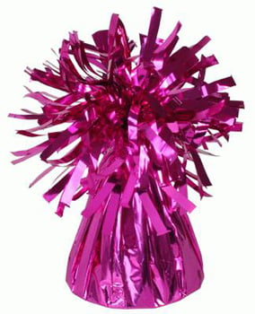 A pink foil balloon weight with tinsel on a white background.