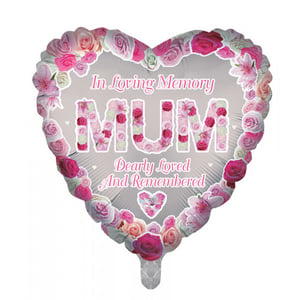 A heart-shaped balloon that says "in loving memory mum, dearly loved and remembered."