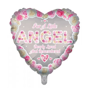 A heart-shaped balloon that says "for a little angel."