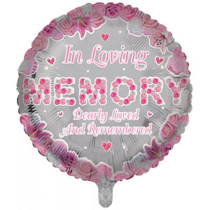 A balloon that says "in loving memory: deeply loved and remembered."