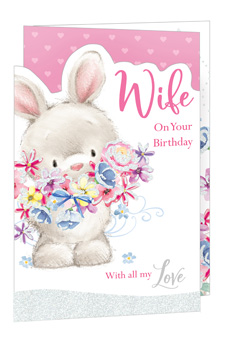 Show your wonderful wife just how much she means to you on her birthday with this utterly charming card. Featuring an adorable fluffy bunny lovingly holding a vibrant bouquet of flowers, it's designed to bring a heartfelt smile to her face.
With its soft pink accents, delicate heart details, and a touch of sparkling glitter, this card beautifully conveys a warm message of love. The sweet illustration and thoughtful sentiment make it the perfect way to show your appreciation on her special day.
Supplied by Out of The Blue Studios Ltd., these delightful 'Wife' birthday cards come in a convenient pack of 6, ideal for keeping your shelves stocked.