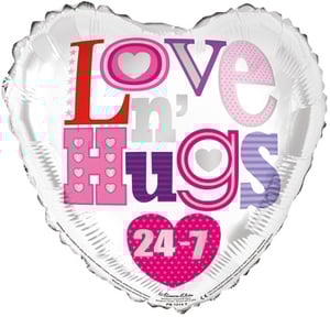 A heart-shaped balloon that says "love 'n hugs."