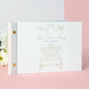 A guest book that says your love story on it.