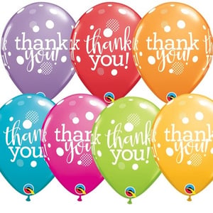 A bunch of balloons in different colors to say thank you.