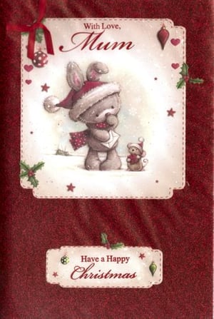 A Christmas card with a teddy bear wearing a Santa hat.