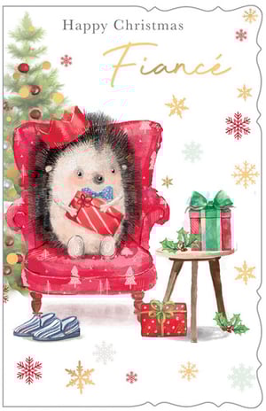 A happy Christmas fiancé card with a hedgehog in a chair.