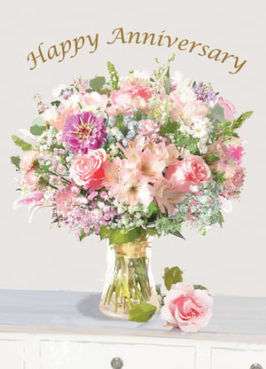 A happy anniversary card with a vase of pink flowers.