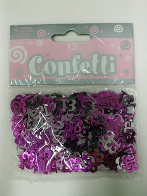A package of pink and black confetti with the number 13 on it.