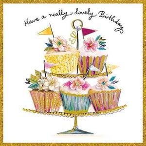A birthday card with cupcakes on a cake stand and the words "have a really lovely birthday".