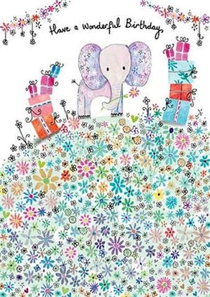A birthday card with an elephant is surrounded by flowers and gifts.