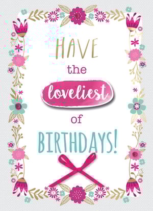 A birthday card that says, "Have the loveliest of birthdays."