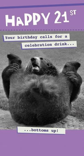 A black and white photo of a bear lying on its back on a birthday card.