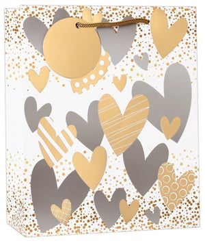 A white bag with gold and silver hearts on it.