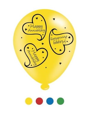 A yellow balloon that says "happy anniversary" on it.