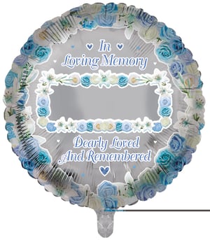 A balloon that says "In loving memory, dearly loved and remembered."