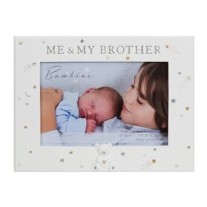 A picture frame that says "me and my brother Bambino" with a teddy bear on it.