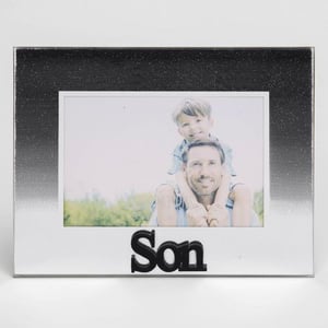 A picture frame with a picture of a father carrying his son on his shoulders is needed.