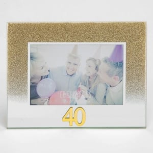 A picture frame with a picture of a family celebrating its 40th birthday.