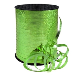 A spool of green ribbon is on a white background.