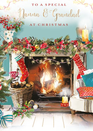 A Christmas card that says "to a special Nanna and Grandad at Christmas."