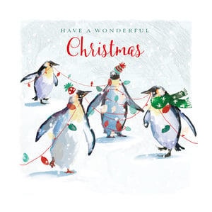 A Christmas card with penguins and the words, "Have a wonderful Christmas."