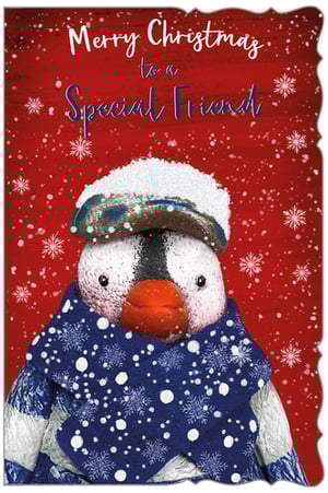 A Merry Christmas card with a penguin on it.