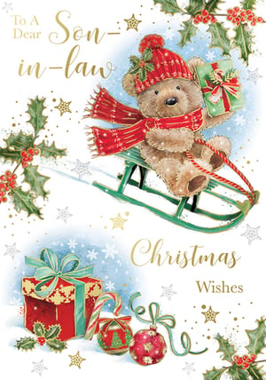 A Christmas card with a teddy bear on a sled.