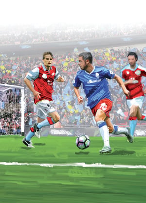 A soccer player in a blue jersey with the word "Lotto" on it.
