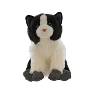 A black and white stuffed cat with blue eyes sits on a white background.