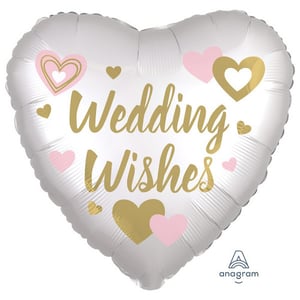 a heart shaped balloon that says wedding wishes