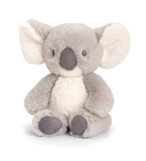 A stuffed koala bear is sitting on a white background.