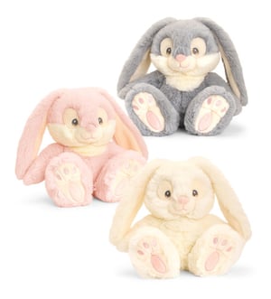 Three stuffed bunny rabbits are sitting next to each other.